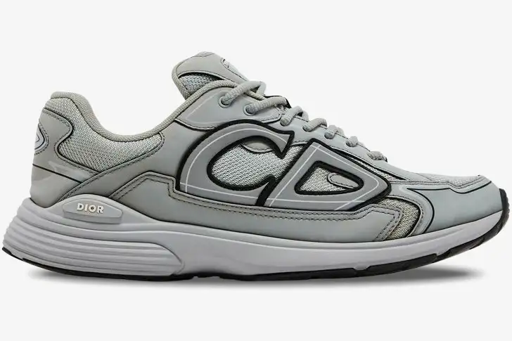 christian-dior-b30-sneaker-grey-side-view-3sn279zrd-h868-110-104 Side profile of a Christian Dior B30 sneaker in grey mesh and technical fabric with a large CD logo. - SKU 3SN279ZRD_H868