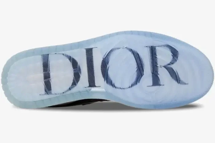 Bottom view of Air Jordan 1 Retro High x Dior featuring a translucent blue outsole with a large Dior logo. - SKU CN8607-002