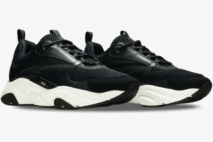 Dior B22 black calfskin and mesh sneakers shown from a side perspective with a chunky white sole. - SKU 3SN231YKB_H969