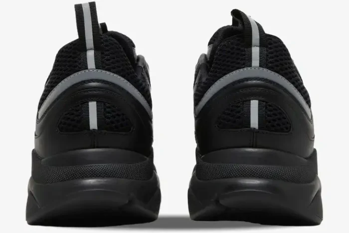 Rear view of Dior B22 Black Silver Reflective sneakers featuring mesh uppers and reflective heel details. - SKU 3SN231ZNG_H969