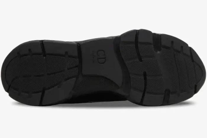 Bottom sole view of black Dior B22 sneakers featuring the CD logo and textured rubber tread. - SKU 3SN231ZNG_H969