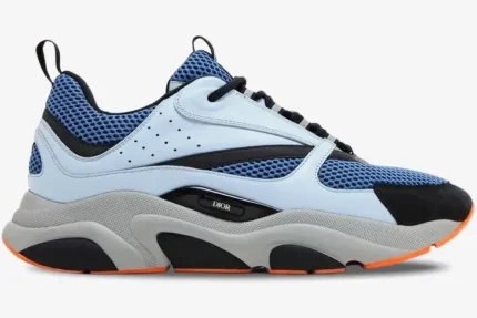 Dior B22 sneaker in light blue, dark blue, and grey with orange accents, side profile view. - SKU 3SN231YKA_H061
