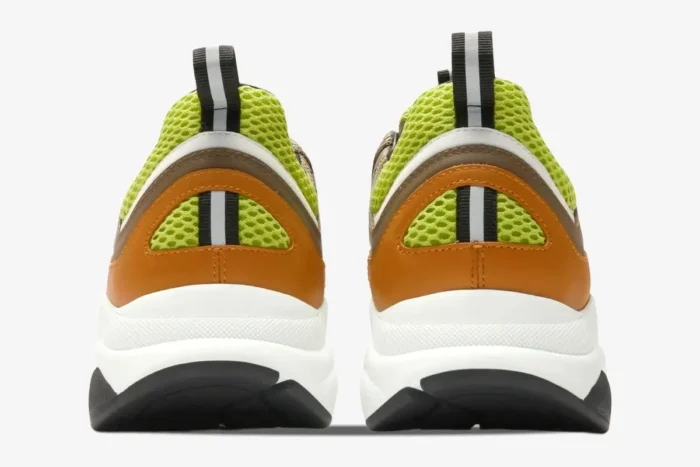 Rear view of Dior B22 'Ebony Green' sneakers featuring lime green mesh and orange leather overlays. - SKU 3SN231YRK_H766