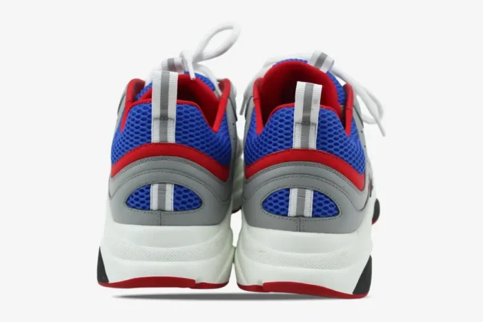 Rear view of Dior B22 'Grey Red Blue' luxury sneakers showing the thick white sole and mesh details. - SKU 3SN231YKB_H865