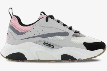 Side profile of Dior B22 'Pale Pink Grey' luxury sneakers with mesh and leather panels on a chunky white sole. - SKU 3SN231YKB_H060