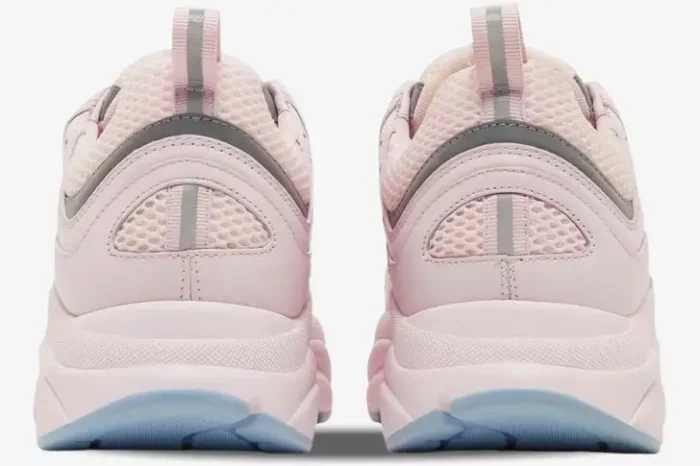 Rear view of Dior B22 sneakers in pink technical mesh with silver accents and chunky pink soles. - SKU 3SN231ZRY_H400