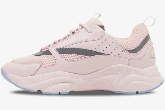Side profile of a Dior B22 sneaker in pink technical mesh with silver accents and a chunky sole. - SKU 3SN231ZRY_H400