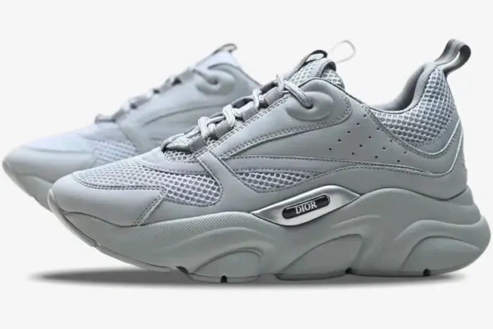 Dior B22 'Triple Grey' luxury sneakers in a side profile view featuring a chunky sole and mesh panels. - SKU 3SN231YKA804