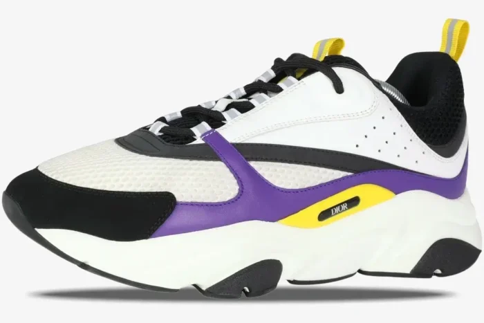 Dior B22 'Violet White' luxury chunky sneaker in a side profile view with purple, black, and yellow accents. - SKU 3SN231YKA_H065