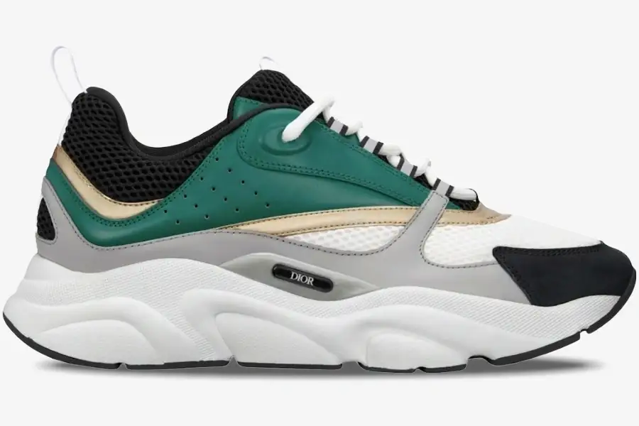 dior-b22-white-black-green-gold-side-view-3sn231zta-h668-526-830 Side profile of Dior B22 sneaker in white, black, green, and gold with a chunky sole. - SKU 3SN231ZTA_H668