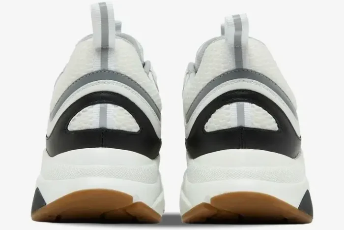 Rear view of Dior B22 White Black luxury chunky sneakers showing the heel design and gum soles. - SKU 3SN231YKB_H968