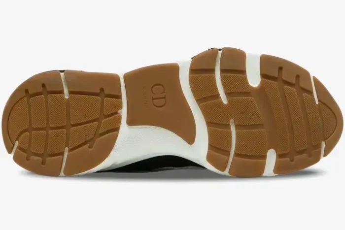 Bottom view of the Dior B22 sneaker showing the gum rubber outsole with white accents and CD logo. - SKU 3SN231YKB_H968
