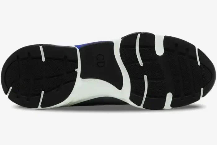 Bottom view of the Dior B22 'White Blue' sneaker outsole featuring black rubber with white and blue accents. - SKU 3SN231YXX_H865