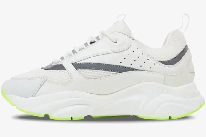 Side profile of Dior B22 sneaker in white, silver, and fluorescent green with chunky sole. - SKU 3SN231YKA_H000