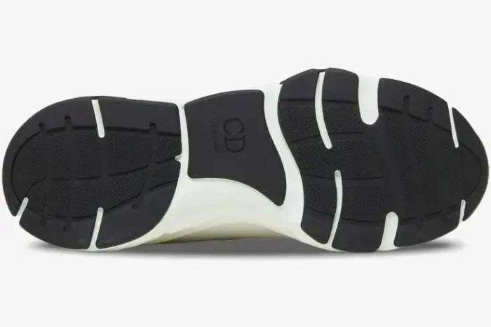 Bottom view of the Dior B22 White Yellow sneaker's black and white rubber sole with CD logo. - SKU 3SN231YKA_H061