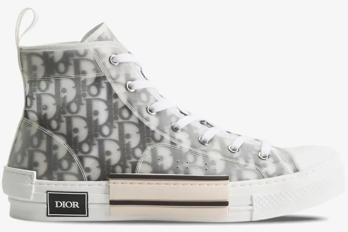 dior-b23-high-top-white-grey-side-view-3sh118yjp-h069 Side profile of a Dior B23 High Top sneaker in white and grey Oblique canvas with translucent panels. - SKU 3SH118YJP_H069