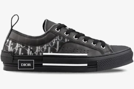 Dior B23 low top sneaker in black and grey oblique canvas, side profile view. - SKU 3SN249YNT_H960