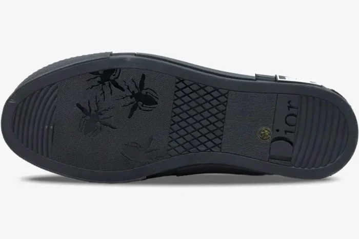 Bottom sole view of Dior B23 Low Top Oblique black sneakers featuring bee motifs and logo. - SKU 3SN249YNT_H960