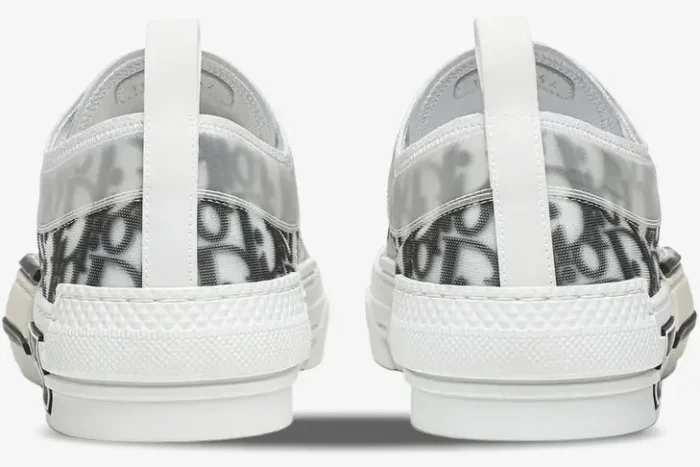 Rear view of Dior B23 Low Top Oblique Canvas sneakers in white and grey, showing the heel and pull tab. - SKU 3SN249YJP_H069
