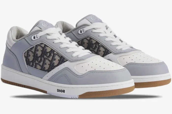 Dior B27 Low sneakers in grey and white leather with Oblique canvas, three-quarter side view. - SKU 3SN272ZIR_H165