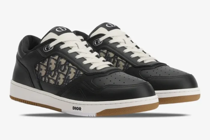 Dior B27 low top sneakers in black leather and Oblique jacquard, three-quarter side view. - SKU 3SN272ZIR_H965