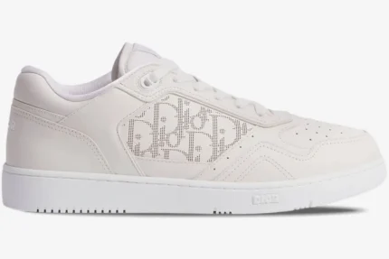 Side profile of Dior B27 Uptown low-top sneakers in white oblique galaxy leather. - SKU 3SN272ZIR_H060