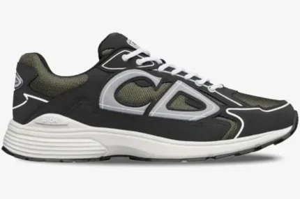 Side profile of a Dior B30 sneaker in deep green and black technical mesh with a white midsole. - SKU 3SN279ZRD_H664