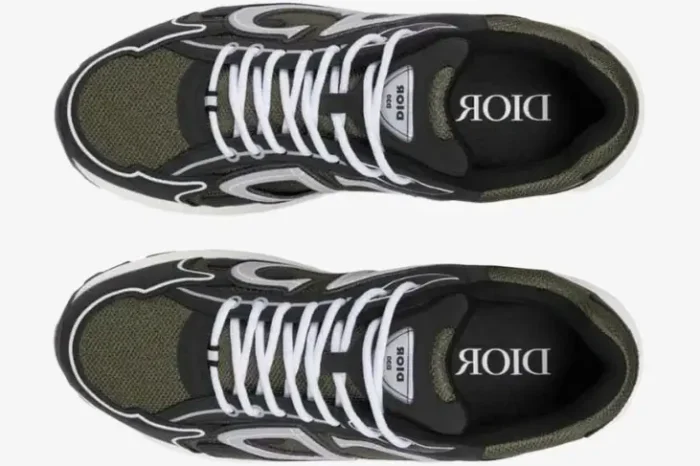 Top-down view of Dior B30 sneakers in deep green and black technical mesh with white laces. - SKU 3SN279ZRD_H664