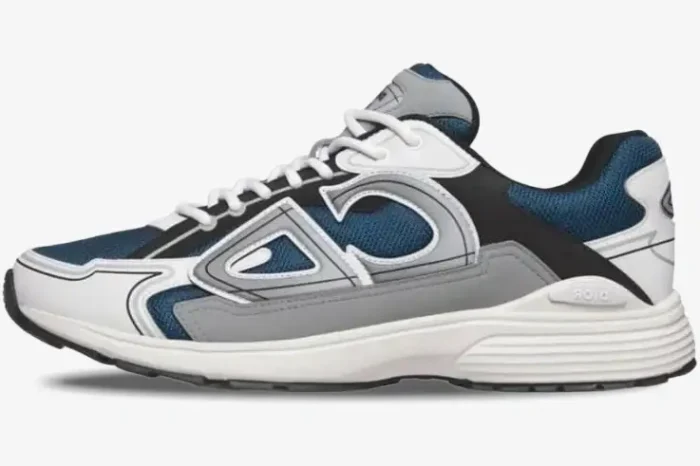 Side view of a Dior B30 sneaker in blue, grey, and white mesh and technical fabric. - SKU 3SN249YXE_H561