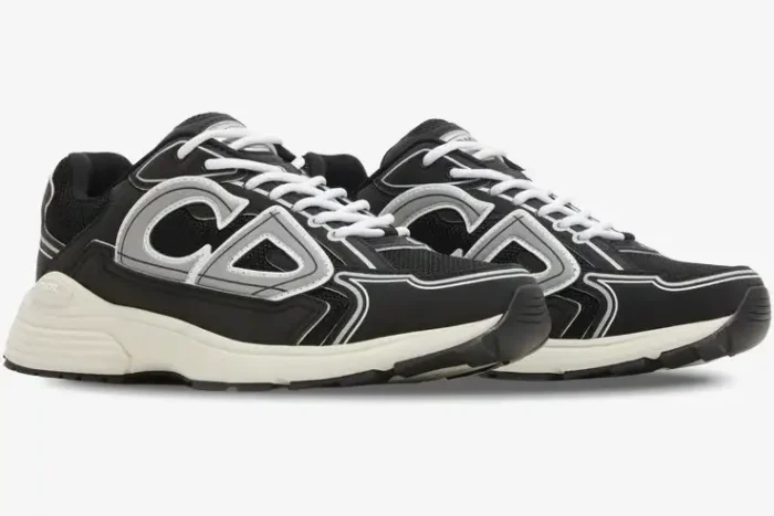 Dior B30 sneakers in black, white, and grey technical mesh shown from a side profile view. - SKU 3SN279ZMB_H969