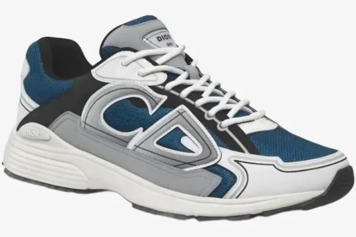 Dior B30 mesh and technical fabric sneaker in blue, grey, and white, shown from a side profile angle. - SKU 3SN249YXE_H561