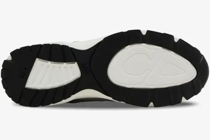 Bottom view of a Dior B30 sneaker showing the black and white rubber outsole with CD logo. - SKU 3SN279ZRB_H560