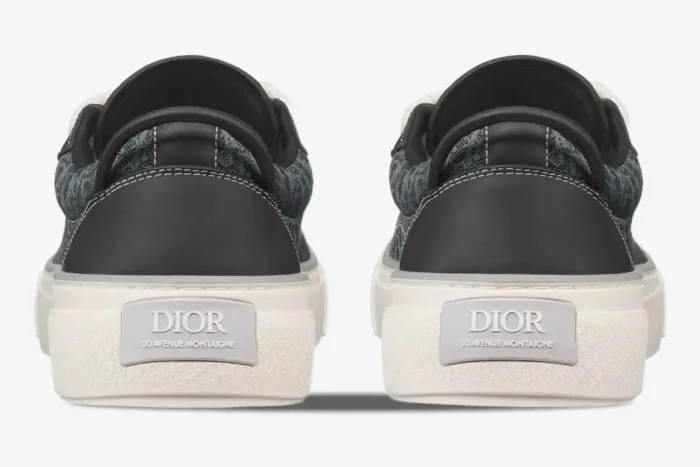 Rear view of Dior B33 Spin sneakers in black oblique jacquard and calfskin with logo heels. - SKU 3SN303ZYS_H981
