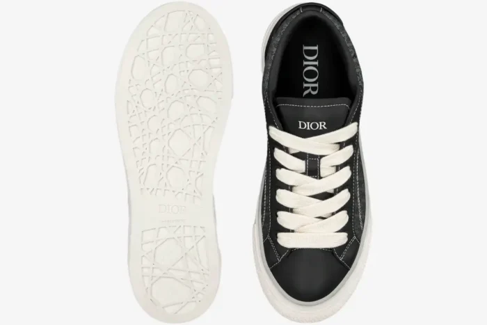 Top-down view of Dior B33 Spin sneakers in black oblique jacquard and calfskin with white sole. - SKU 3SN303ZYS_H981