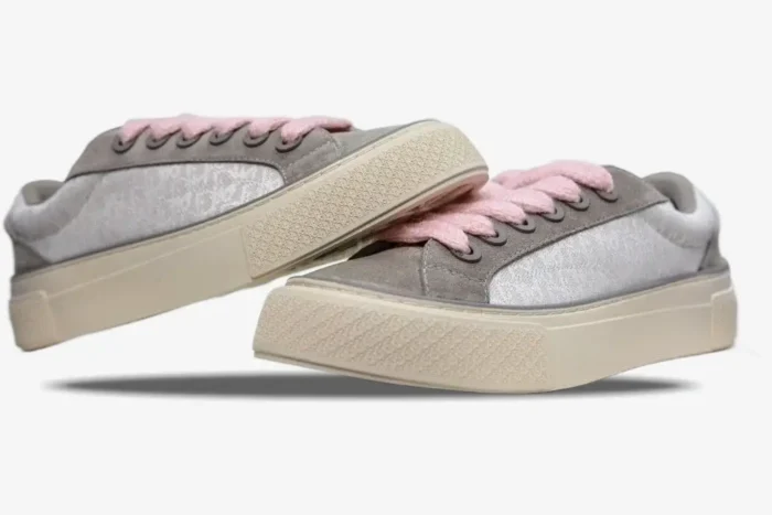 Dior B33 women's sneakers in grey and white oblique jacquard with pink laces, side profile view. - SKU 3SN303ZWN_H858