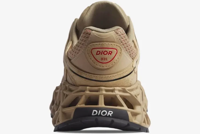 Back view of Dior B35 NXXT sneaker in beige suede and red technical mesh with chunky sole. - SKU 3SN323AAY_H134