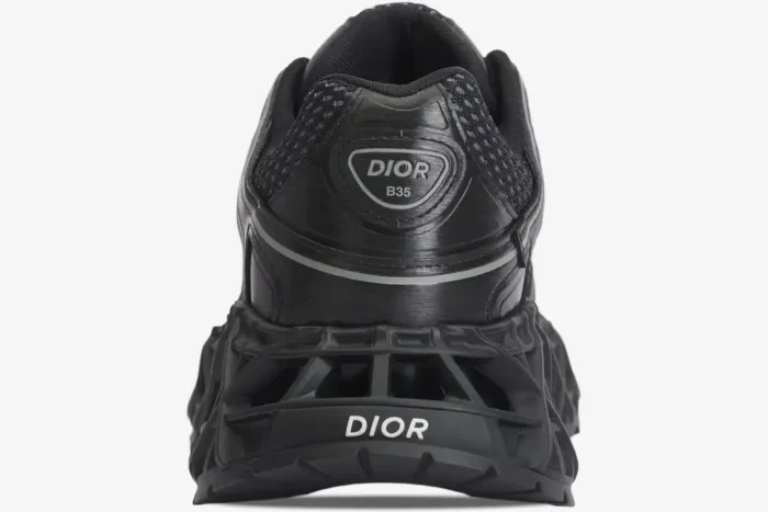 Back view of the black Dior B35 NXXT sneaker featuring a 3D-printed lattice sole and heel branding. - SKU 3SN323ZCY_H968