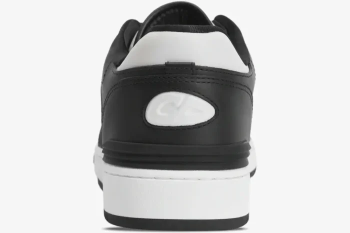 Rear view of Dior B57 Dribble low-top sneaker in black and white leather featuring the CD logo. - SKU 3SN318ZXU_H960