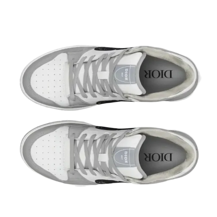 Top-down view of white and grey Dior B57 Dribble low-top sneakers with grey laces. - SKU 3SN318ZXU_H860