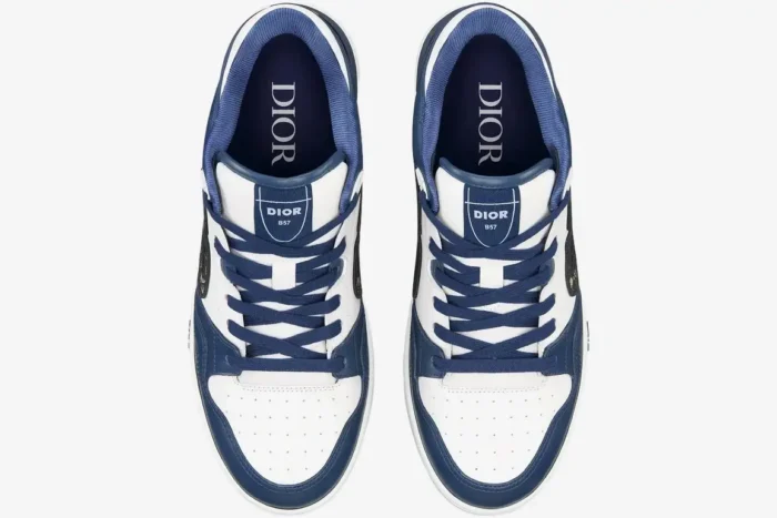 Top-down view of Dior B57 low-top sneakers in blue and white leather with navy laces. - SKU 3SN318ZXU_H553