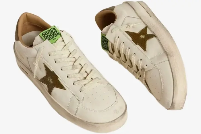 Golden Goose Stardan white leather sneakers with military green snake print star, angled pair view. - SKU GMF00667.F007555.10502