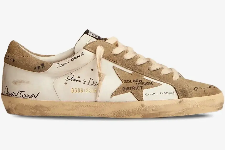 golden-goose-super-star-ltd-miami-graphics-side-f002647-341-856 Golden Goose Super-Star LTD Miami Graphics sneaker in white and beige, side profile view with handwritten details. - SKU F002647