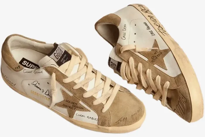 Golden Goose Super-Star Miami Graphics sneakers in white and tan suede, three-quarter view. - SKU F002647
