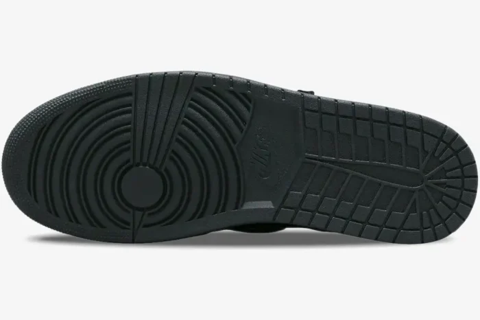 Bottom sole view of the all-black Air Jordan 1 Low OG x Travis Scott Black Phantom sneaker. - SKU DM7866-001
