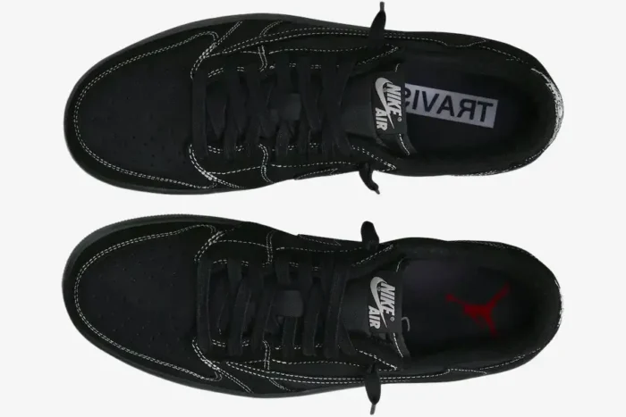 Top view of black Air Jordan 1 Low OG x Travis Scott Black Phantom shoes with white contrast stitching. - SKU DM7866-001
