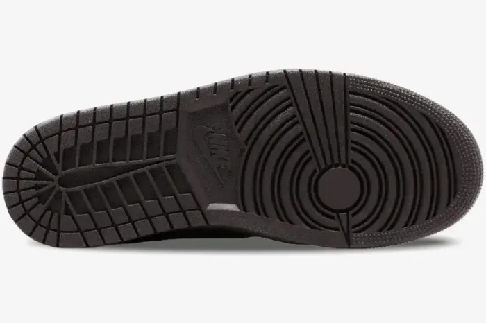 Bottom view of the dark brown outsole of the Air Jordan 1 Low OG SP x Travis Scott Velvet Brown sneakers. - SKU DM7866-202