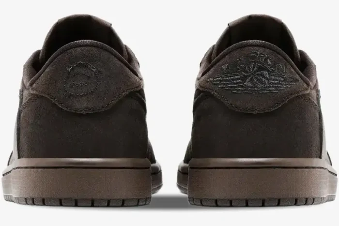 Rear view of Air Jordan 1 Low OG SP x Travis Scott Velvet Brown sneakers showing embroidered heel logos. - SKU DM7866-202
