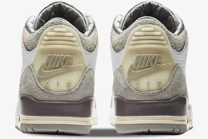 Rear view of Air Jordan 3 Retro x A Ma Maniere SP sneakers in grey and white with cream heel tabs. - SKU DH3434-110
