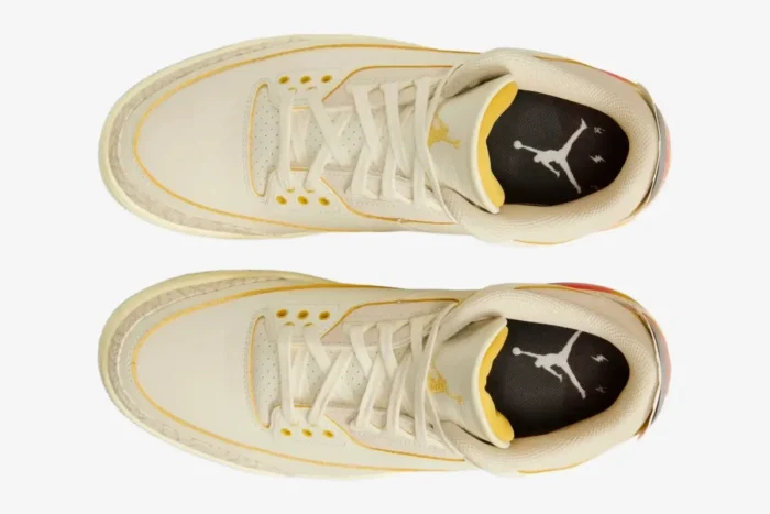 Top-down view of cream Air Jordan 3 Retro x J Balvin sneakers with yellow accents and white laces. - SKU FN0344-901