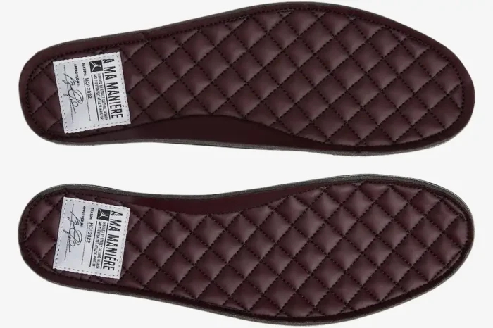 Top-down view of the quilted violet ore insoles from the Air Jordan 4 Retro x A Ma Maniére collaboration. - SKU DV6773-220